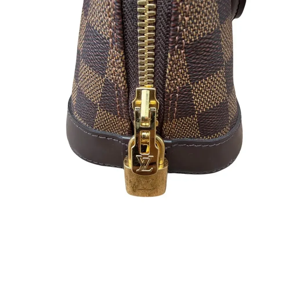 Louis Vuitton Damier Ebene Alma Handbag
